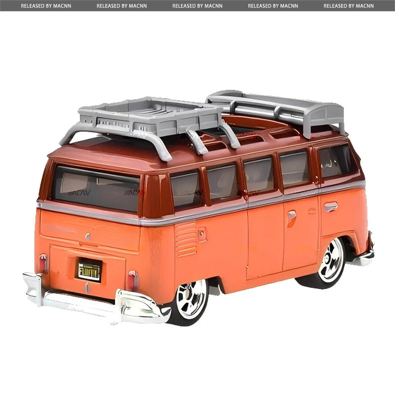 A diecast Hot Wheels Boulevard - 1967 Volkswagen Samba Bus, featuring an orange and brown finish, roof rack, silver trim, chrome bumpers, and a custom license plate—shown from the rear left side.