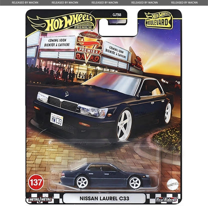 Hot Wheels Boulevard 2025 - Mix 5E by Hot Wheels features the Nissan Laurel C33 in packaging, displaying its illustration before a vibrant movie theater marquee and premium branding at the top.