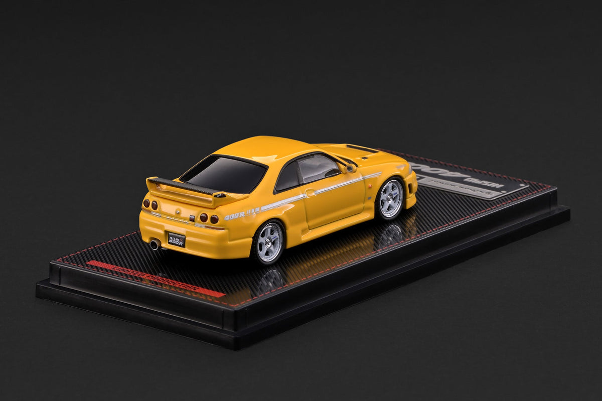 Ignition Model 1:64 Nissan NISMO 400R (BCNR33) Yellow – IG4272 – rear three-quarter view
