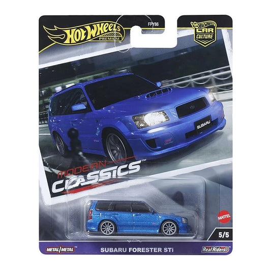The Hot Wheels Modern Classics 2024 Subaru Forester STi features sleek blue graphics and comes in branded packaging showing the real car in motion, with a detailed diecast model and Modern Classics logos included.
