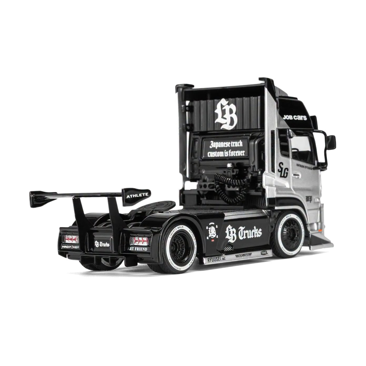 Motorhelix 1:64 LB Truck UD QUON Black & Silver – M61206 – rear three-quarter view